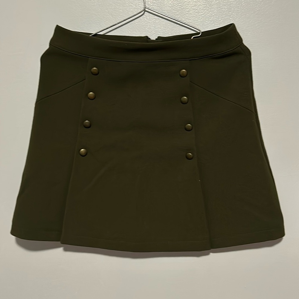 Green skirt with button detailing